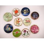 Eight Stratton compacts with floral cover and two compacts with floral covers (unknown maker) (10)