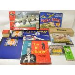 Vintage games including jigsaw puzzles, Magnus gold plated trumpet, practice softball on rope,