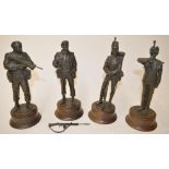 Four bronze cast figures of British soldiers by Peter Hicks (two modern and two Victorian era).