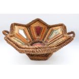 WW1 or WW2 period Prisoner of War straw work basket with inset Italian lithograph portraits and