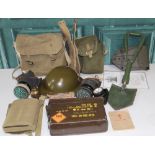 Military WWII & later field equipment including Brodie helmet, cased gas mask and two other gas