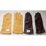 Two pairs of lined aviation gloves, in brown leather with press stud fastening, goatskin tan