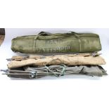 Three vintage military camp beds (two UK, one US)