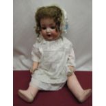 Armand Marseille 996 A 7 M bisque headed doll with curly brown wig, satin bonnet and lace detailed