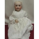 SFBJ French bisque headed doll model 235 10, wearing lace detailed christening gown, H47cm