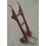 Wood and metal porters trolley with solid metal wheels