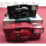 Olympus XA2 with flash in red finish, Olympus XA3 with flash and box.