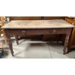 Victorian pine side table, planked top above two painted drawers with turned wooden handles on