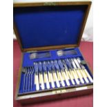 Oak cased twelve place silver plated canteen of cutlery with faux handles by George Butler and Co