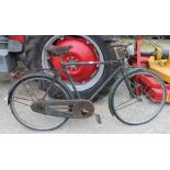 Vintage Raleigh road bicycle, with three gears and Dynamo lighting system and Brooks leather seat