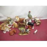 Beswick deer and fowl, fox, donkeys, and a collection of other ceramic animals including large
