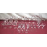 Collection of cut glasses including wine glasses, crystal champagne , liquor, etc