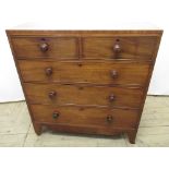 19th century mahogany chest two short and three long graduated cockbeaded drawers with turned wooden