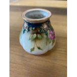 Royal Worcester vase with roses and gilded highlights, base stamped 291 H10.49