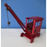 Tri-ang No 1 red tinplate crane, H32cm, chain for hook has been partially replaced