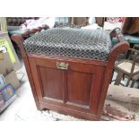 Edwardian walnut music stool, with upholstered top and three division and four front reedit