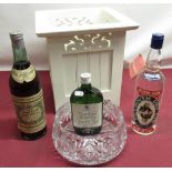 Small wooden planter including a bottle of Plymouth Dry Gin, a bottle of Noilly Pratt and Co