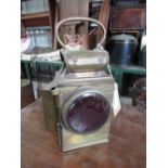 J & R Oldfield "Dependence" brass lamp with red front lens, patent Rd. No. 42?005, H26cm and a