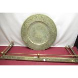 C20th Chinese brass charger with engraved dragon to centre surrounded by a Greek key border the