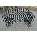 Hand crafted garden bench constructed from used horse shoes, approx W170cm D50cm H100cm