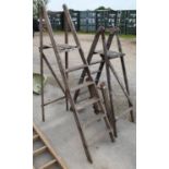 Two sets of wooden step ladders, one labelled Ford Products, small three rung ladder (3)