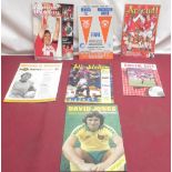 Seven various football programmes signed by Rob Newman,Joe Corrigan, Phil Boyer, Nobby Stiles,