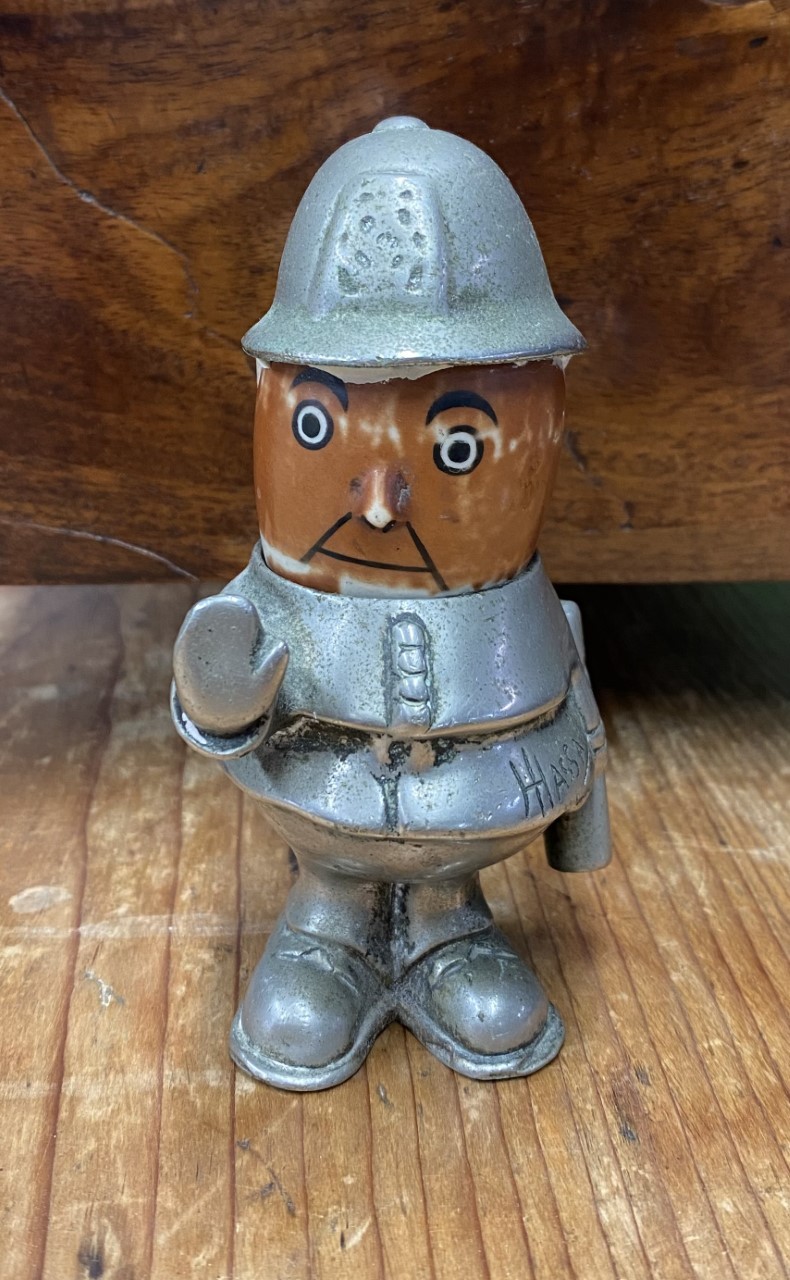 Early C20th Hassall chrome plated "Bobby" policeman car mascot with pottery head (A/F) RD No. 61194,