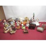 Collection of musical figurines including carousel elephant and horse, clowns, ballerina etc (2