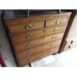 C19th mahogany crossbanded oak chest of two short and four long graduated drawers with oval brass