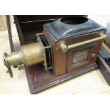 Early C20th mahogany and brass magic lantern projector with box of slides