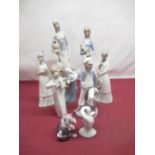 Lladro figurine of a sailor boy, girl playing a fiddle (AF) and a kitten wearing a pink bow and