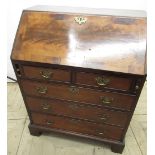 George III style mahogany bureau, curl veneer crossbanded ball front interior, above two short and