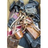 Box of various vintage camera cases and leather camera straps including Pentax, Kodak, Zorki, Exa