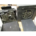 Cased Victor 16mm cine projector 1740 together with matching Victor cased loud speaker