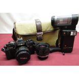 Minolta X-700 with 50mm F2 standard lens, Tamron 24mm lens and flash gun in gadget bag