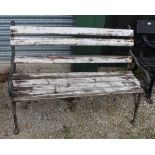 Small garden bench with wooden slats and cast ends in form of branches, L120cm H83cm