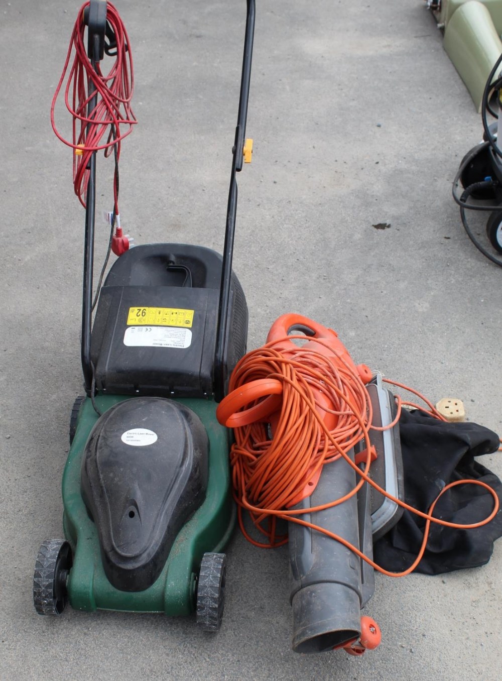 B&Q electric lawn mower and a Flymo Scirocco electric leaf blower, (A/F)