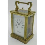 Mappin and Webb Ltd, 20th century eight day brass carriage clock, white enamel dial,with visible