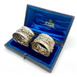 Pair of Victorian hallmarked Sterling silver napkin rings, repoussé decorated with acorns and oak