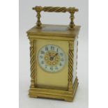 C20th gilt brass cased carriage timepiece, circular cream Arabic dial with blued steel hands,