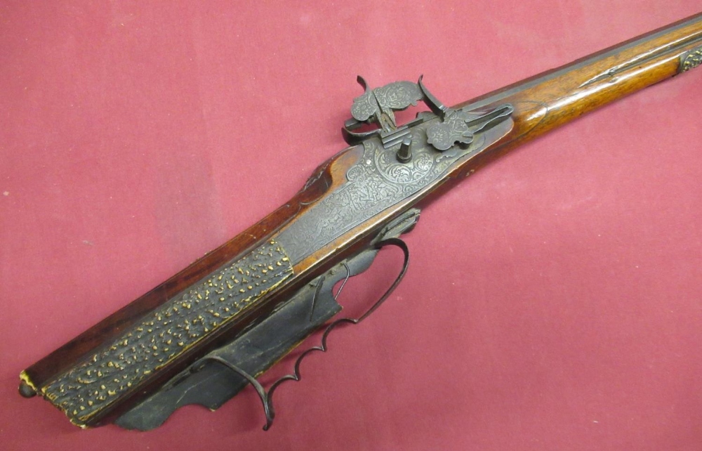 Early C18th German/Austrian wheel lock rifle, with 25 1.4" octagonal rifle barrel, with iron