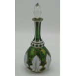 C20th white overlaid green glass oil bottle, mallet shaped body with gilt scrollwork, faced clear