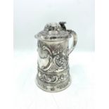 Geo.III hallmarked sterling silver lidded tankard, probably later engraved and repousse with flowers
