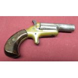 Colt Thuer 3rd model Deringer .41 rimfire single shot, 2.5 swivel barrel signed Colt, bronze frame