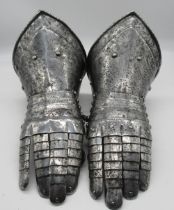 Pair of Italian style C19th steel articulated gauntlets