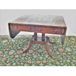 Regency satinwood banded rosewood sofa table, rectangular top with two fall leaves above alternating