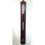 C20th marine style brass mounted black japanned mercury stick barometer and thermometer by Baird &