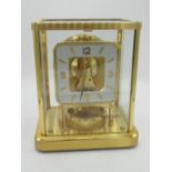 1960's Jaeger-LeCoultre Atmos clock, rectangular gilt metal case with rounded corners, square dial