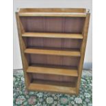 Robert Mouseman Thompson of Kilburn - an oak bookcase, galleried adzed top and and sides with