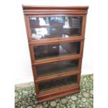 C20th Globe-Wernicke mahogany sectional bookcase, four tiers with glazed doors, moulded cornice
